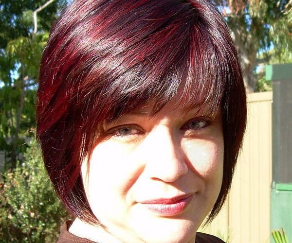 Silky Black Bob Cut Hairstyle Red Highlights Has Pointed | Medium In Short Hairstyles With Red Highlights (View 18 of 20)