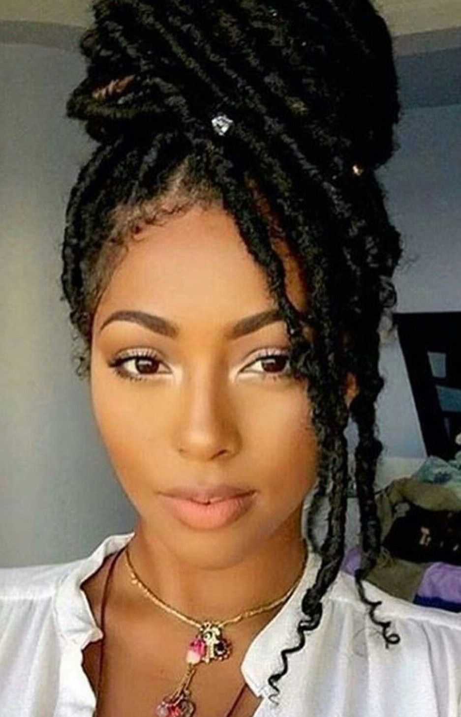 20 Lovely Hairstyles For Black Women (with Pictures) | Dread Bun Regarding Dreadlock Updo Hairstyles (View 9 of 15)
