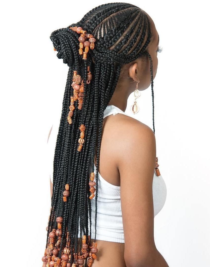 20 Trendiest Fulani Braids For 2018 Within 2017 Swooped Up Playful Ponytail Braids With Cuffs And Beads (View 6 of 15)
