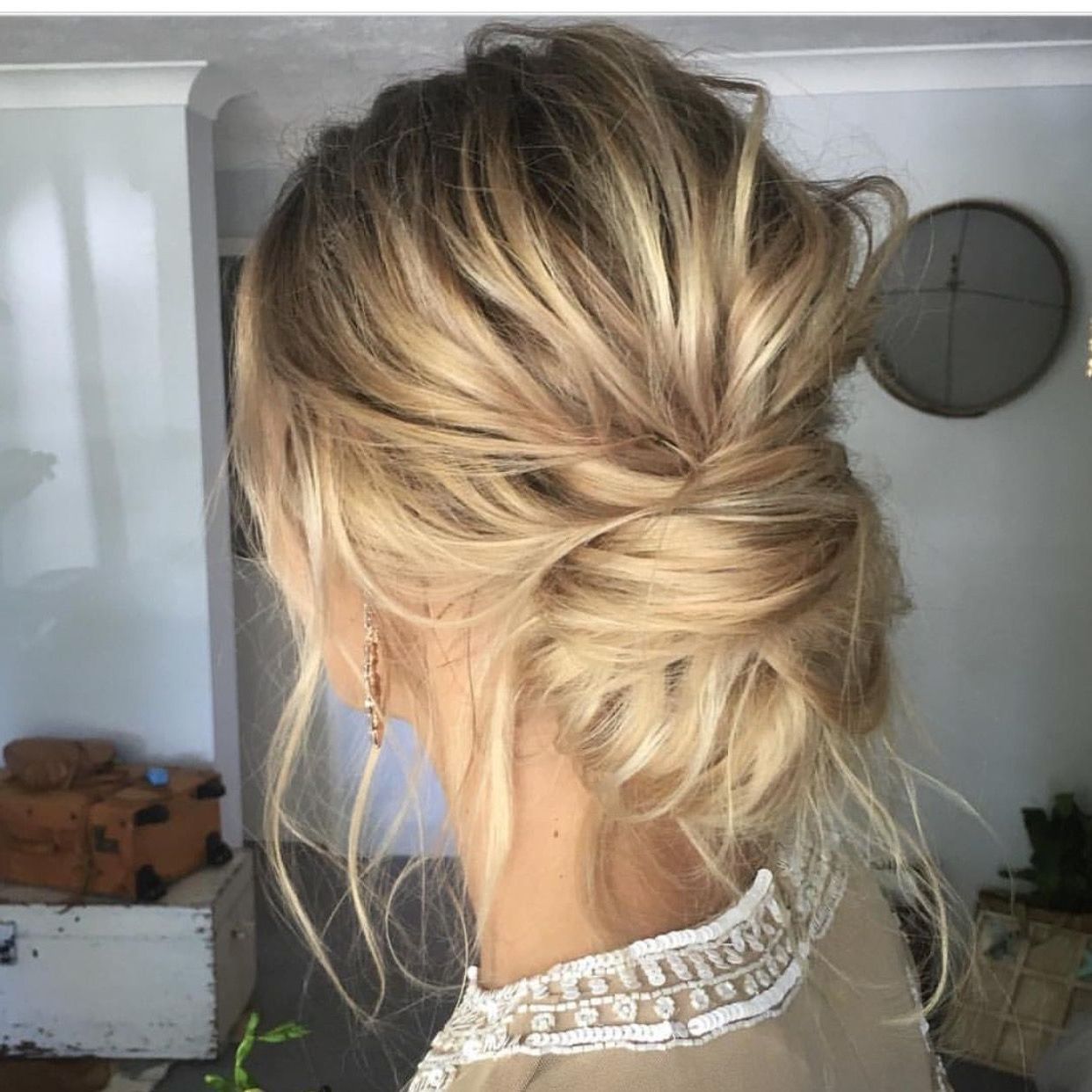 Best And Newest Casual Bun With Highlights Regarding This Low Twisted Bun Is What Textured Hair Dreams Are Made Of! We (View 14 of 15)