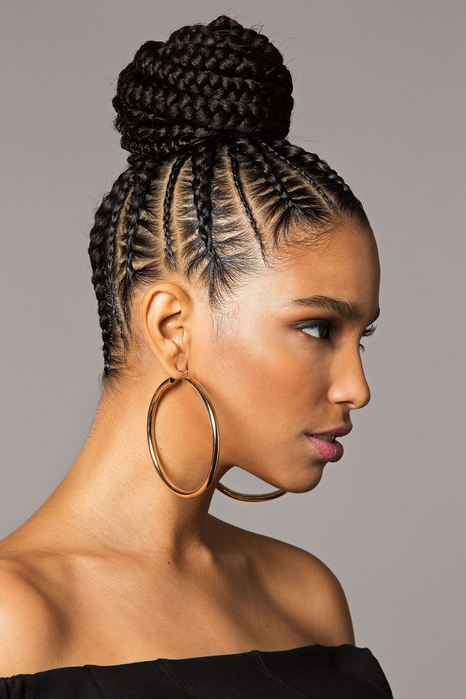 You're Going To Want To Wear This Bomb Braided Bun All Summer Long Regarding Current Cornrows Hairstyles In A Bun (View 1 of 15)