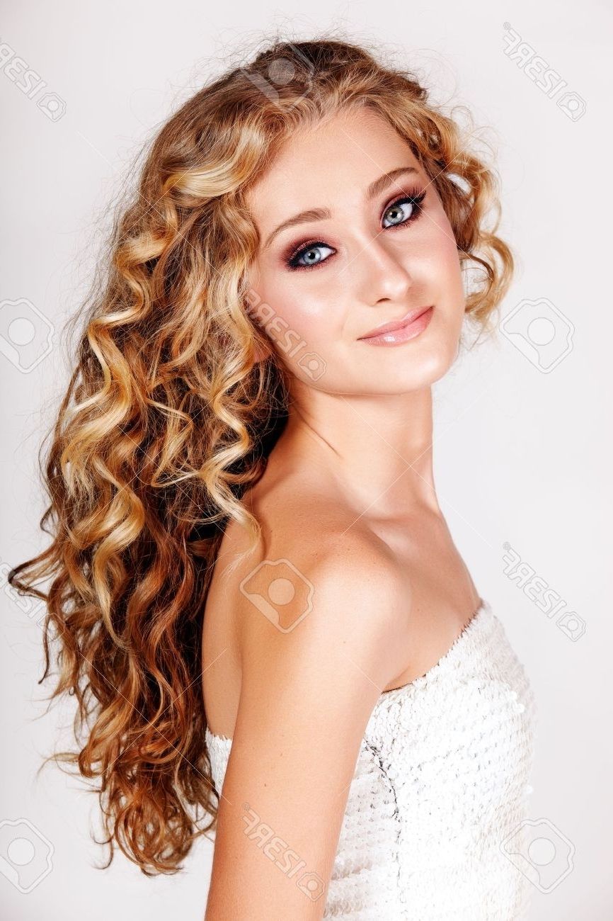 Beautiful Young Blonde Woman With Long Curly Hair In White Fashion Regarding Newest White Blonde Curls Hairstyles (View 3 of 20)