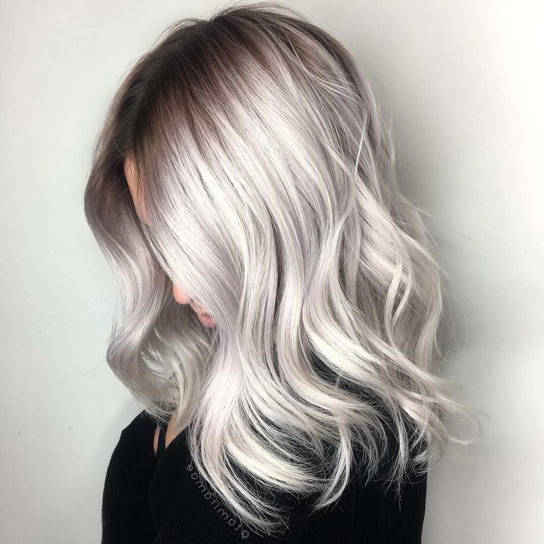 Large Waves: Blonde Platinum Silver Hair With Wavy Curls And Medium Throughout Newest Icy Waves And Angled Blonde Hairstyles (View 6 of 20)