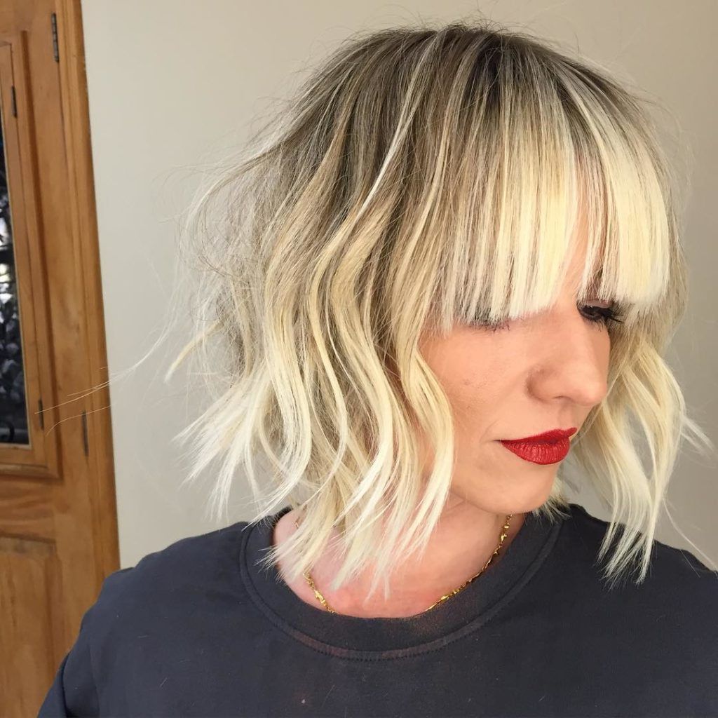 Women's Long Blonde Bob With Choppy Layers And Full Bangs Inside Messy Choppy Layered Bob Hairstyles (View 15 of 20)