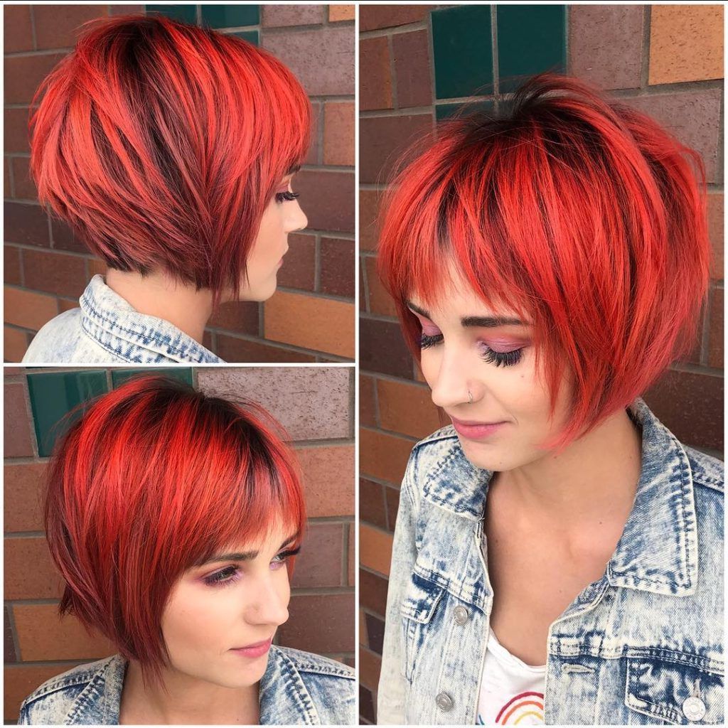 Choppy Red Graduated Bob With Fringe Bangs And Black Shadow Roots Pertaining To Black Choppy Pixie Hairstyles With Red Bangs (View 1 of 20)