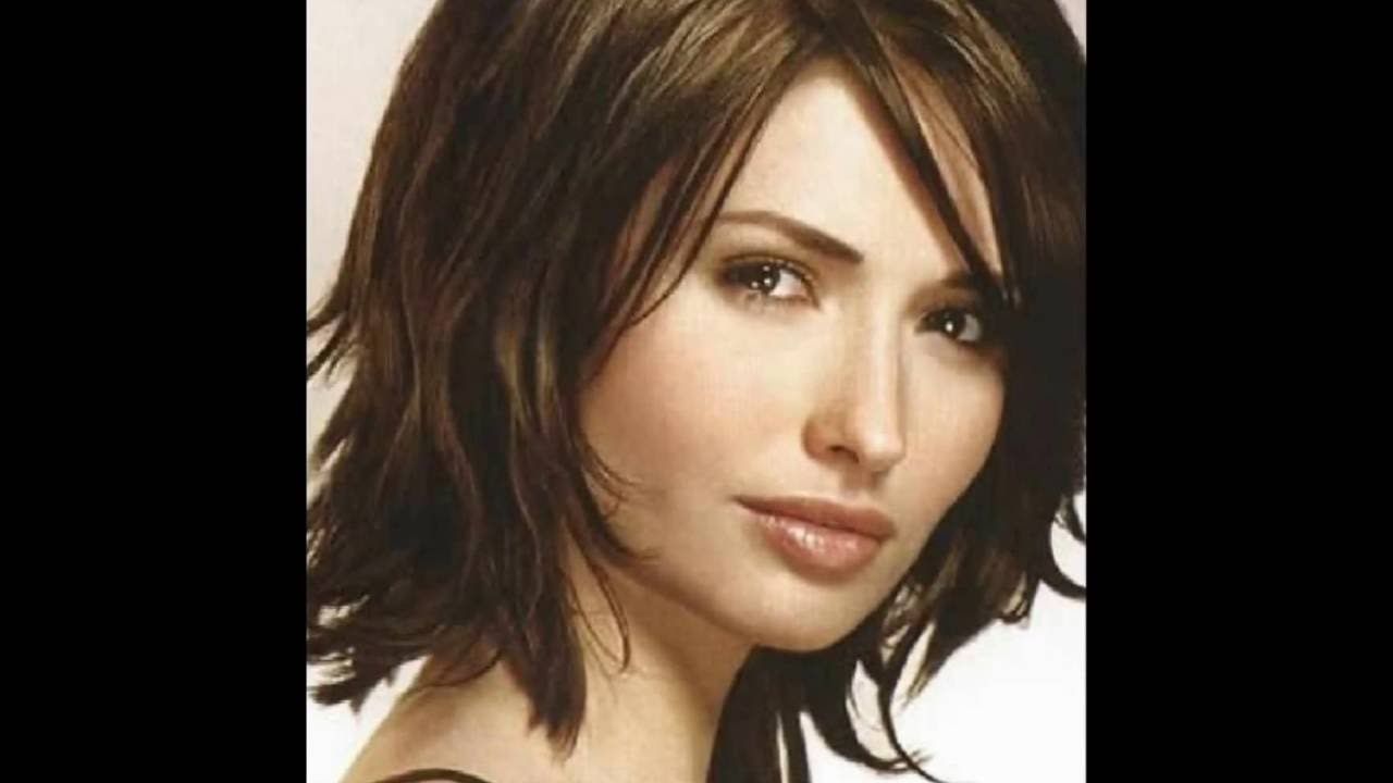 Medium Length Throughout Famous Layered Medium Hairstyles With Bangs (View 8 of 20)