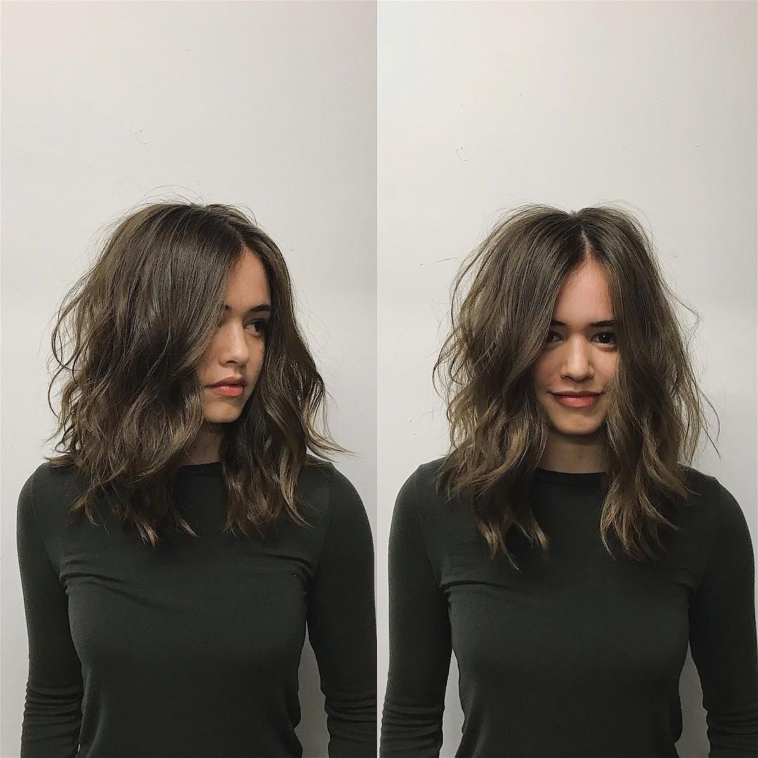 Most Current Medium Hairstyles Brunette Layers With Regard To This Brunette Layered Cut With Messy Wavy Texture And Center Part Is (View 10 of 20)