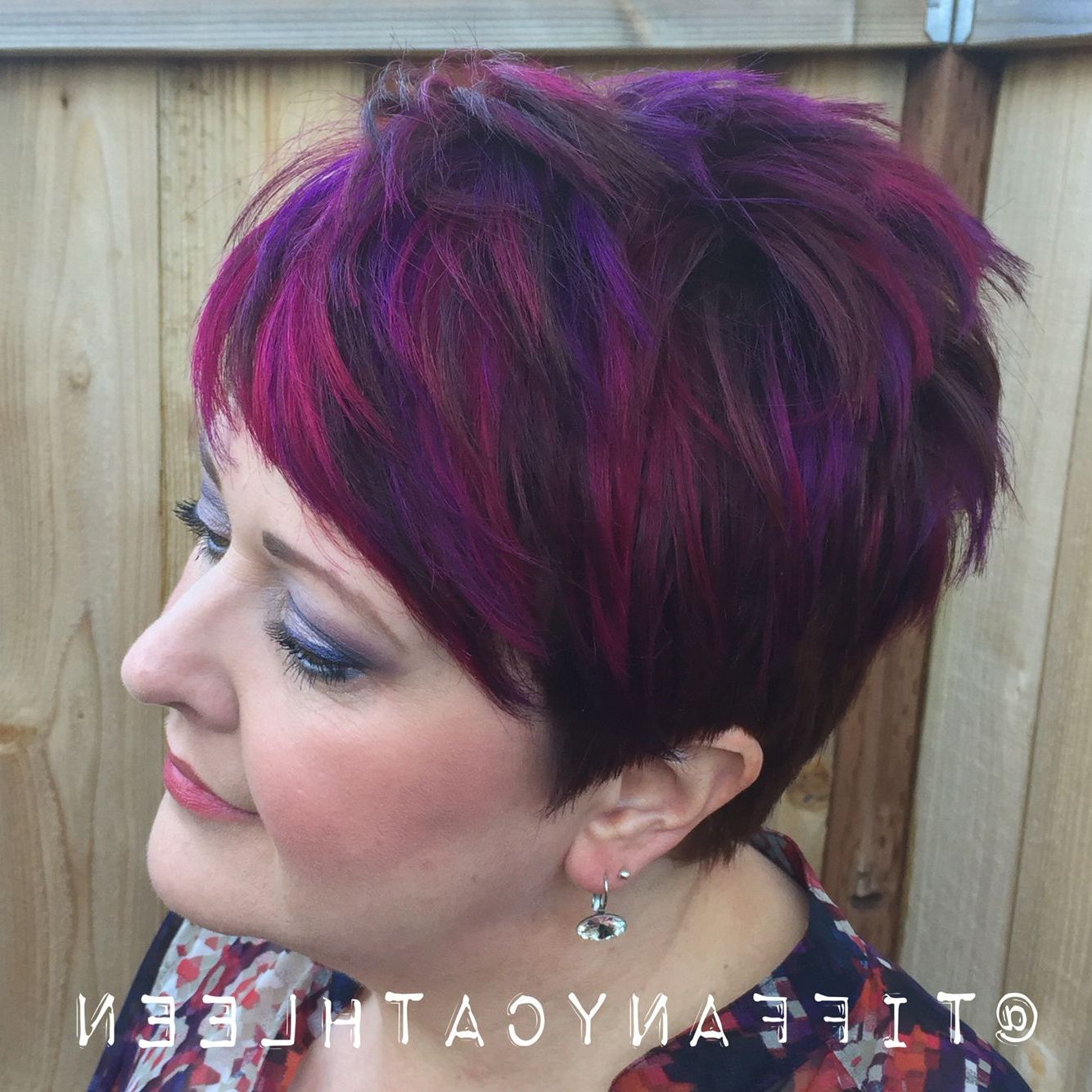 Newest Spiky Mohawk Hairstyles With Pink Peekaboo Streaks In Pixie Cut With Magenta And Violet Balayage Highlights. (Gallery 1 of 20)