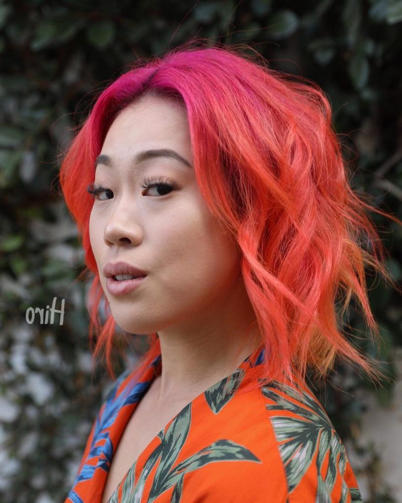 Women's Undone Wavy Layered Bob With Curtain Bangs And Fiery Neon Throughout Well Liked Medium Haircuts With Fiery Ombre Layers (View 15 of 20)