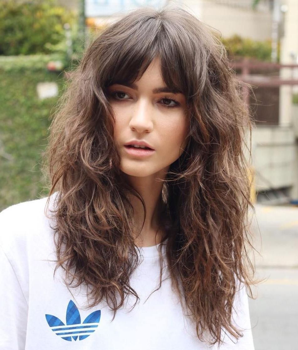 Most Popular Messy Loose Curls Long Hairstyles With Voluminous Bangs With 50 Cute And Effortless Long Layered Haircuts With Bangs (View 3 of 20)