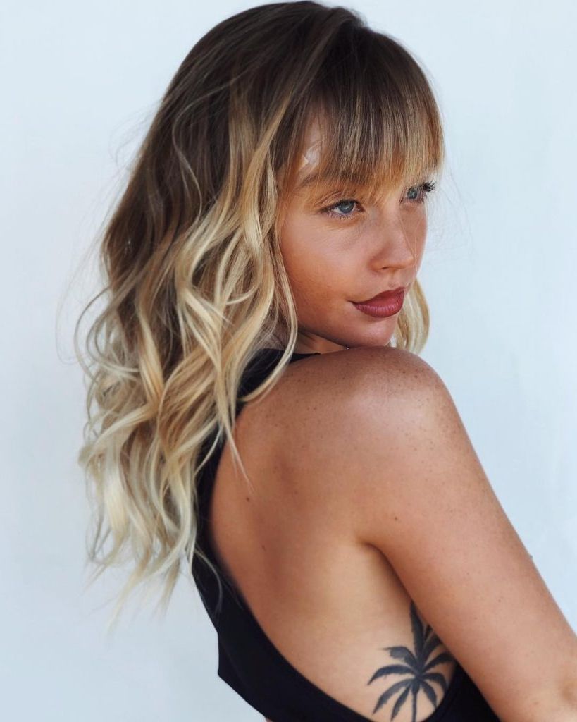 Preferred Long Choppy Haircuts With A Sprinkling Of Layers With Regard To Women's Layered And Banged Cut With Messy Boho Chic Waves And Sun (View 11 of 20)