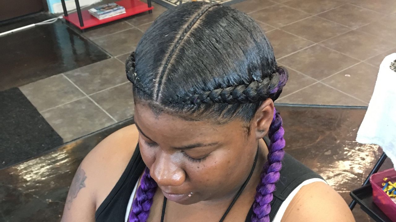 2 Feed In Braids With Small Braid In The Middle In Current Skinny Braid Hairstyles With Purple Ends (View 11 of 20)
