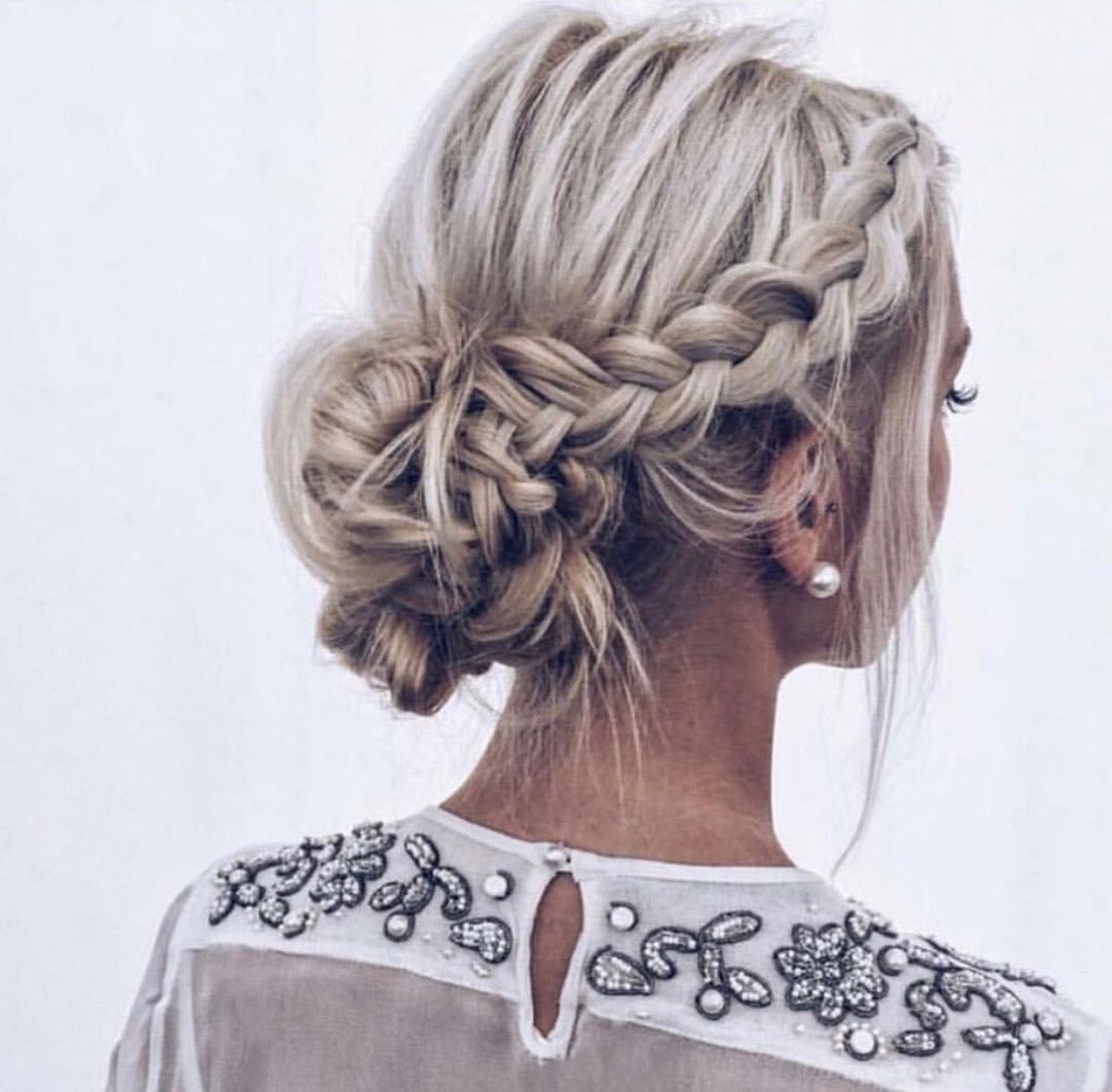 The Perfect Braided Updo: Teased, Messy Side Braid Fading In Most Up To Date Teased Fishtail Bun Updo Hairstyles (View 5 of 20)