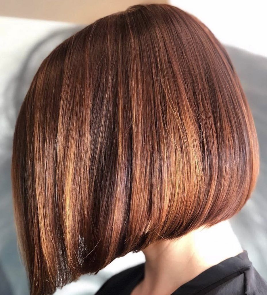 8 Short Bob Hairstyles To Try This Year Within Most Current Short Asymmetric Bob Hairstyles With Textured Curls (View 18 of 20)