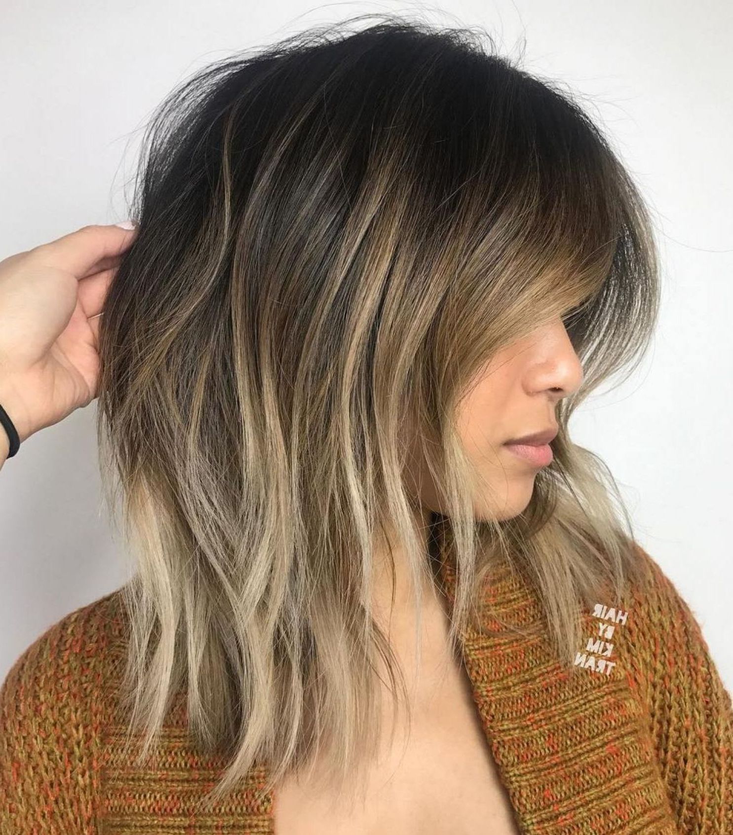 2019 Long Disconnected And Highlighted Shag Haircuts Within 60 Fun And Flattering Medium Hairstyles For Women In  (View 2 of 20)