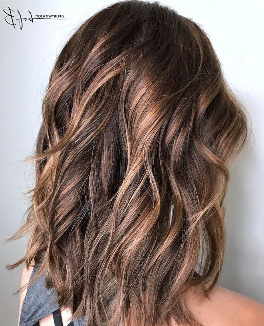 Current Warm Toned Wavy Brunette Shag Hairstyles Throughout 10 Layered Hairstyles & Cuts For Long Hair In Summer Hair (View 12 of 20)