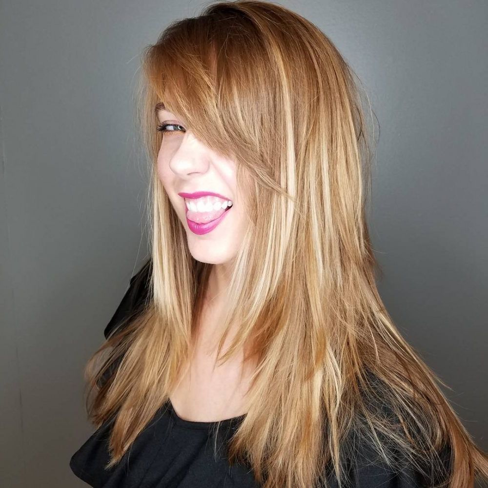 Favorite Longer Haircuts With Thoroughly Layered Bottom With 20 Most Flattering Hairstyles For Long Faces In  (View 9 of 20)