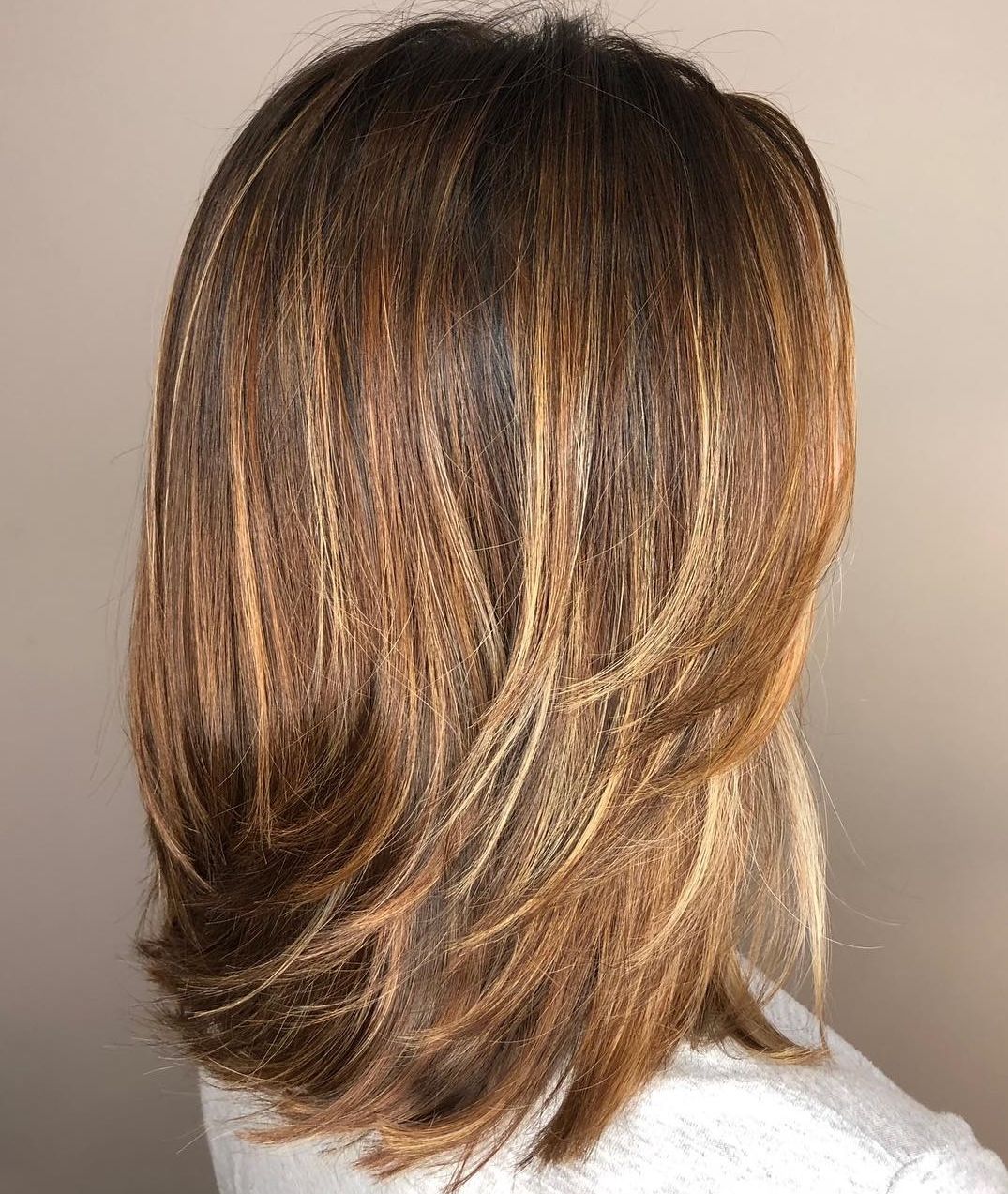 Must Try Medium Length Layered Haircuts For 2019 With Regard To Well Known Medium Haircuts With Flipped Ends For Thick Hair (View 12 of 20)