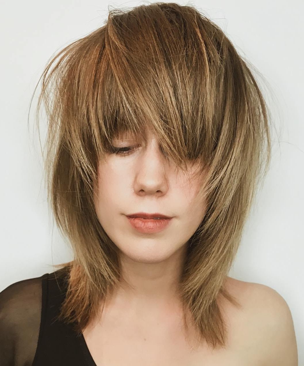 The Most Instagrammable Hairstyles With Bangs In 2019 Pertaining To Current Feminine Feathered Shag Haircuts For Medium Hair (View 6 of 20)