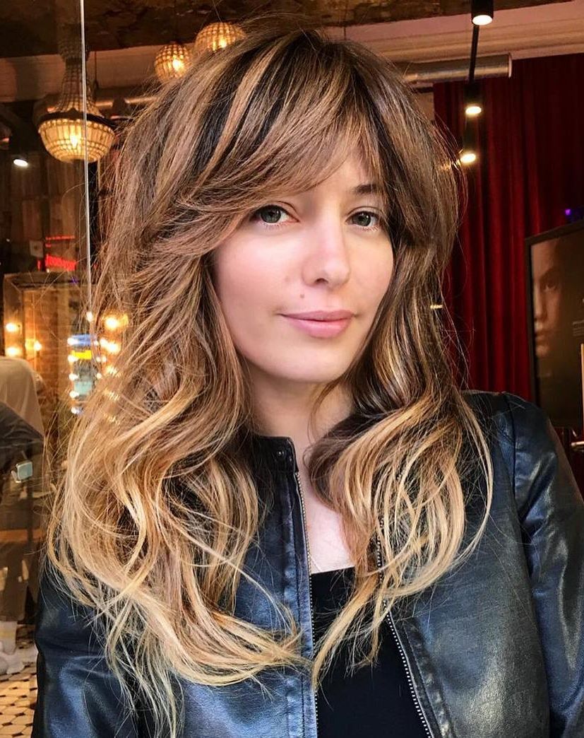 The Most Instagrammable Hairstyles With Bangs In 2019 Within 2019 Long Disconnected And Highlighted Shag Haircuts (View 20 of 20)