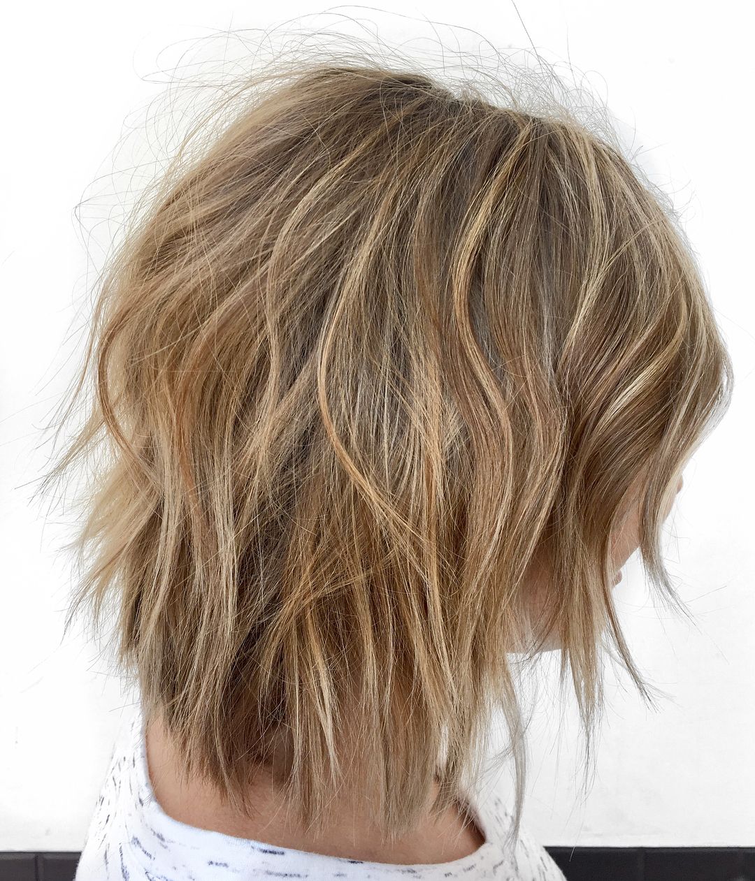 Well Known Bronde Shaggy Hairstyles With Feathered Layers In How To Pull Off Medium Length Haircuts And Hairstyles In  (View 14 of 20)