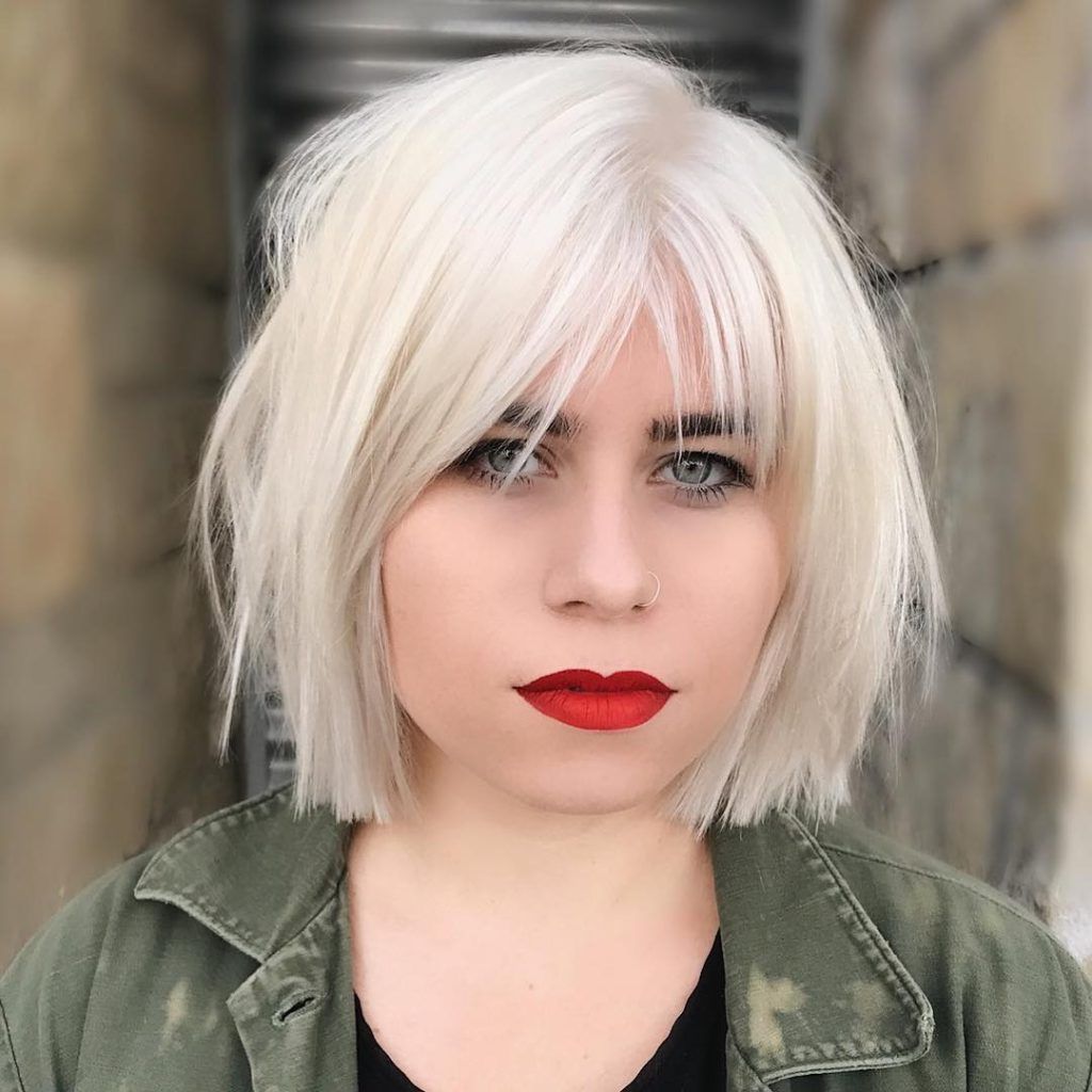 Women's Platinum Choppy Bob With Parted Fringe Bangs And With Regard To Jaw Length Choppy Bob Hairstyles With Bangs (View 20 of 20)