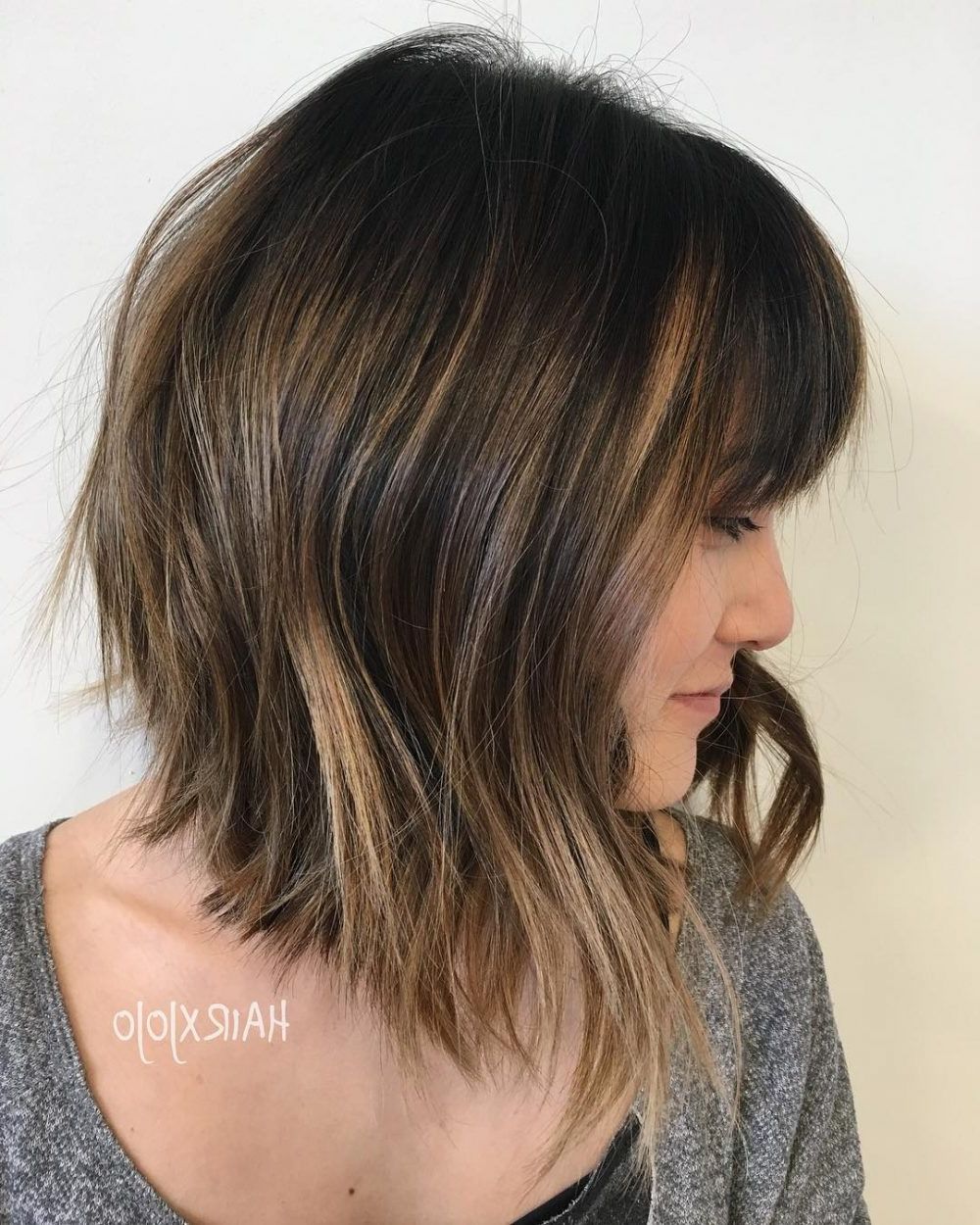 Most Popular Long Feathered Bangs Hairstyles With Inverted Bob Within 15 Layered Inverted Bob Haircut Ideas That Look Amazing (View 4 of 20)