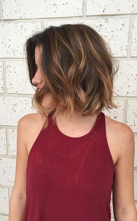 Fashionable Short Loose Curls Hairstyles With Subtle Ashy Highlights Regarding 10 Stylish Short Wavy Hairstyles With Balayage – Short (View 19 of 20)