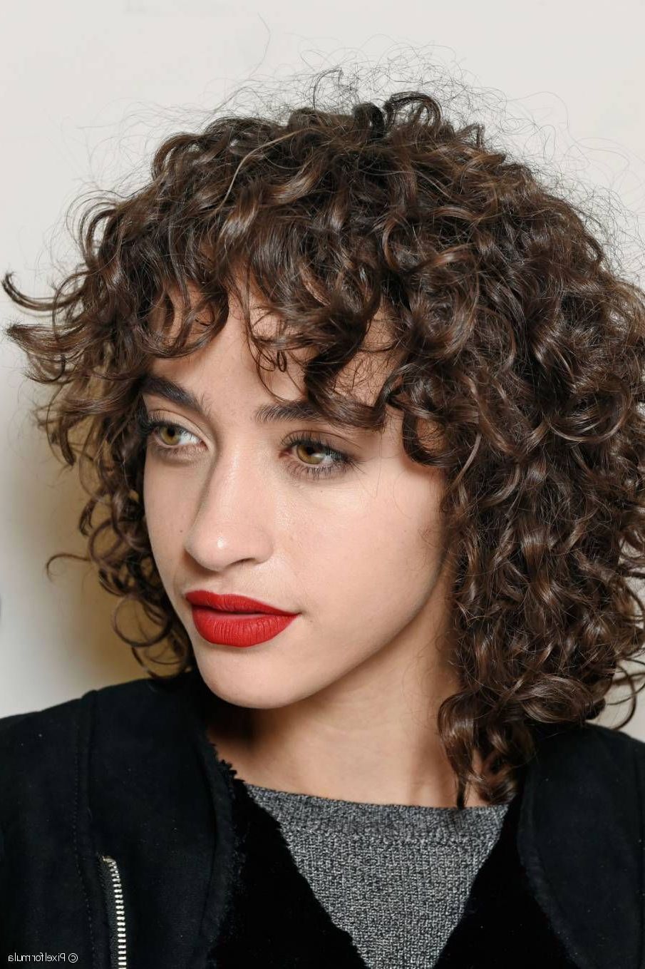 Curly Hair Styles Naturally Pertaining To Most Recently Released Wavy Hairstyles With Short Blunt Bangs (View 15 of 20)