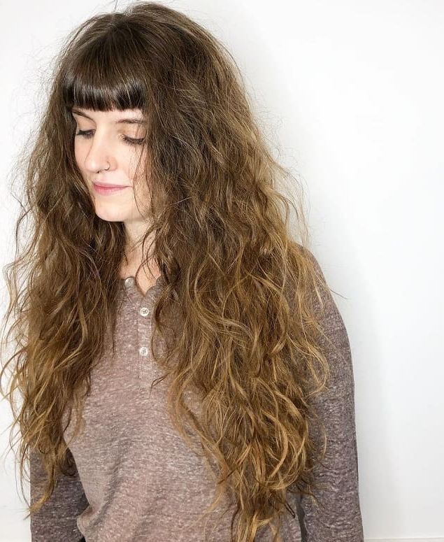 Latest Naturally Wavy Hairstyles With Bangs Pertaining To 10 Beautiful Curly Hairstyles With Straight Bangs (View 16 of 20)