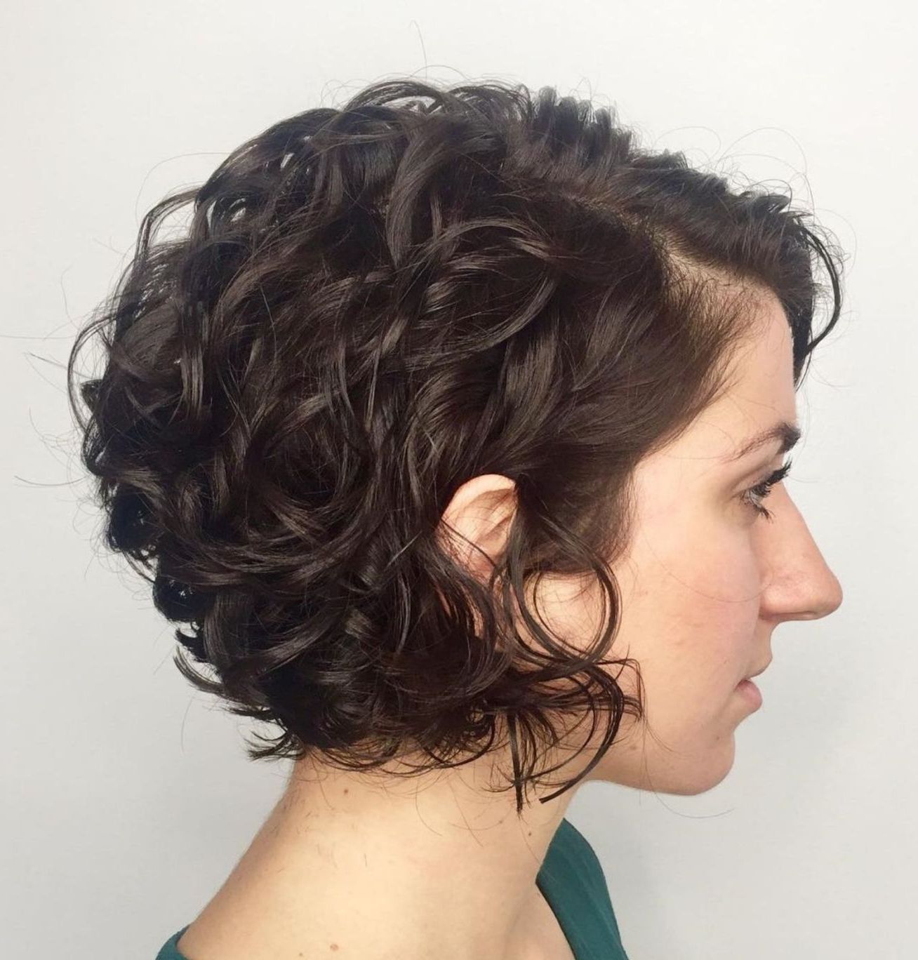 Preferred Short Wavy Bob Hairstyles With Bangs And Highlights Inside Jaw Length Curly Bob With Bangs (View 4 of 20)