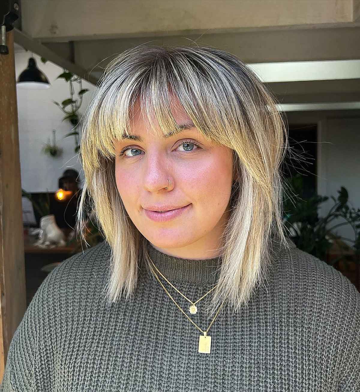 31 Medium Layered Haircuts With Bangs For A Stunning Combination Throughout Most Recent Medium Length Haircuts With Arched Bangs (View 9 of 20)