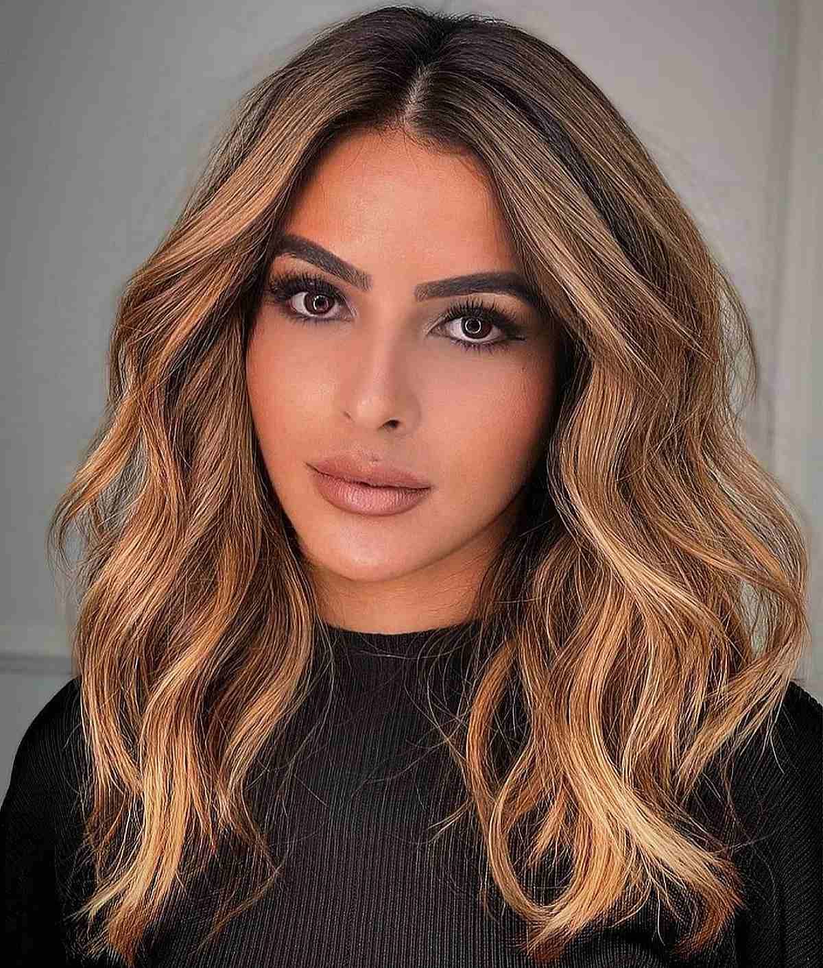 43 Flattering Middle Part Hairstyles Trending Right Now Inside Recent Middle Parted Messy Lob Haircuts (View 4 of 20)