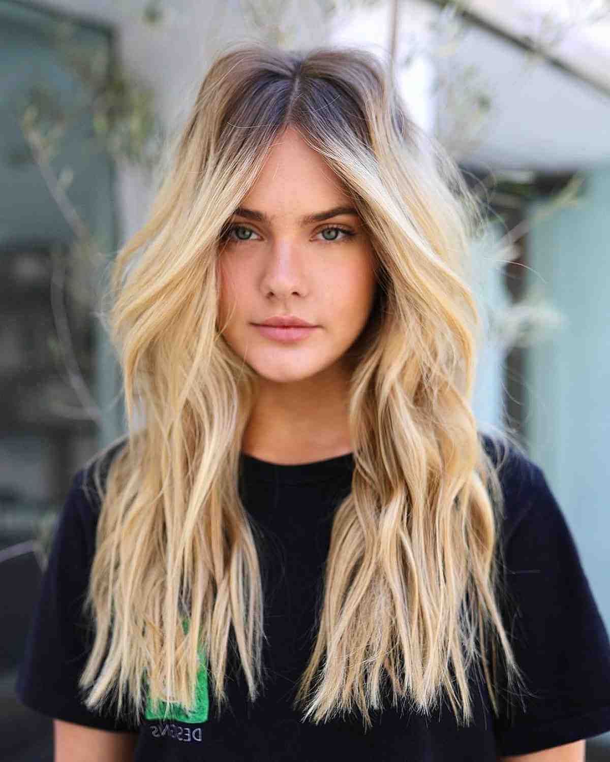 43 Flattering Middle Part Hairstyles Trending Right Now Regarding Most Current Middle Parted Medium Length Hairstyles (View 16 of 20)