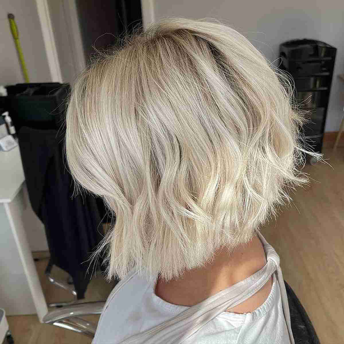 50+ Inverted Bob Haircuts Women Are Getting In 2022 Within Widely Used Icy Blonde Inverted Bob Haircuts (View 4 of 20)