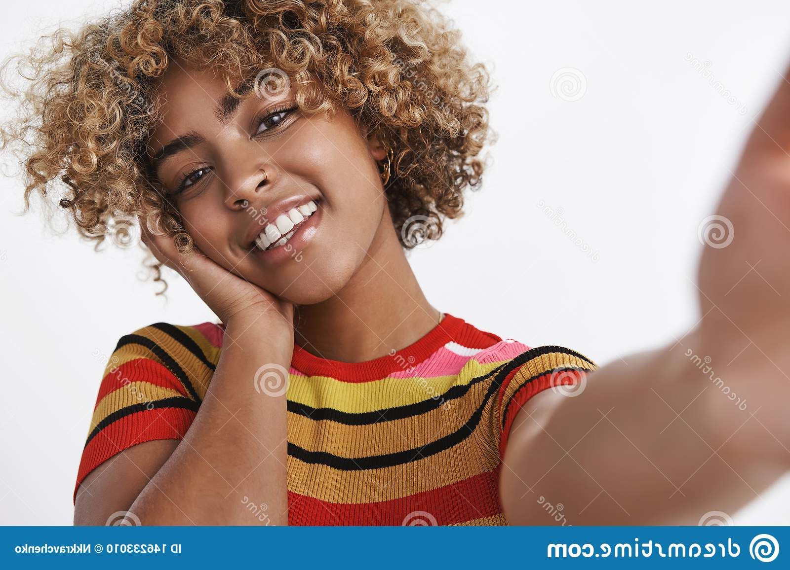 Famous Carefree Curls Haircuts Regarding Selfie Shot Of Stylish African American Woman With Pierced Nose And Fair Curly  Haircut Tilting Head Carefree And Tender Stock Photo – Image Of  Advertisement, Person:  (View 12 of 20)