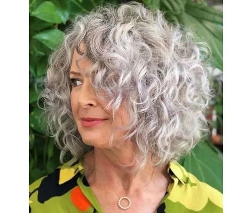Latest Medium Length Curly Haircuts With Regard To 31 Best Curly Hairstyles For Women Over 60 –  (View 17 of 20)