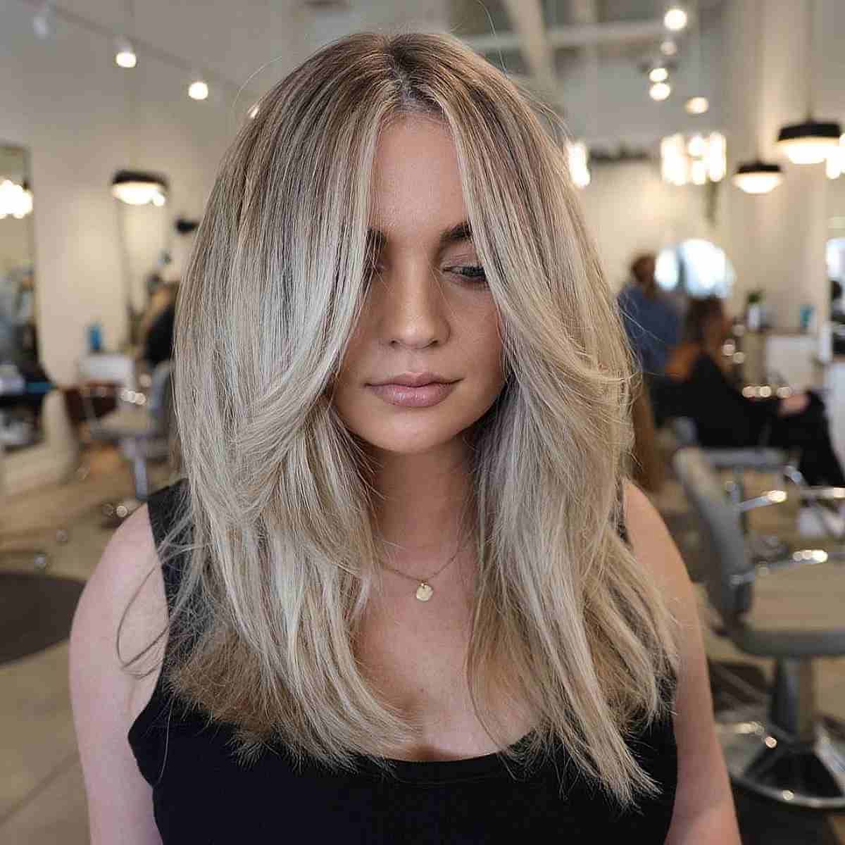 Latest Middle Part Straight Haircuts With 43 Flattering Middle Part Hairstyles Trending Right Now (View 2 of 20)