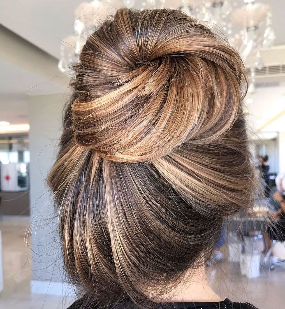 24 Messy Bun Hair Ideas That You Need To Try Out Inside Most Recent Messy Chignon With Highlights (View 6 of 15)