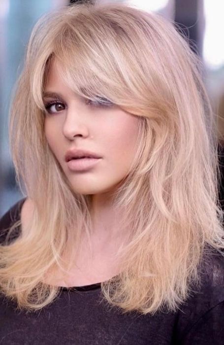 30 Side Swept Bangs Hairstyles & Haircuts For 2023 For Most Recent Choppy Hair With Layers And Side Swept Bangs (View 10 of 15)