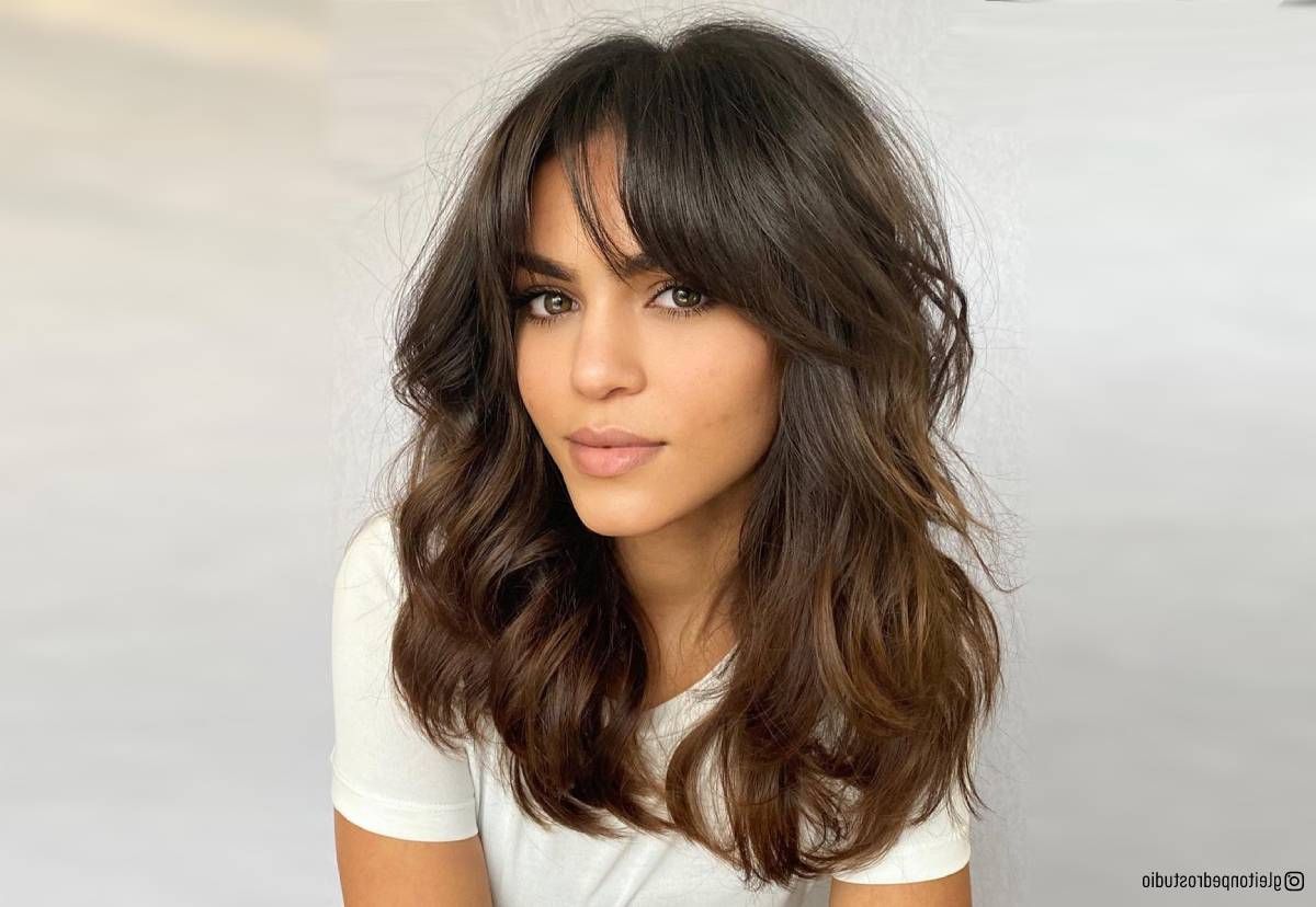 32 Ways To Pair Wavy Hair With Bangs For A Super Flattering Look Regarding 2018 Slightly Curly Hair With Bangs (Gallery 1 of 15)