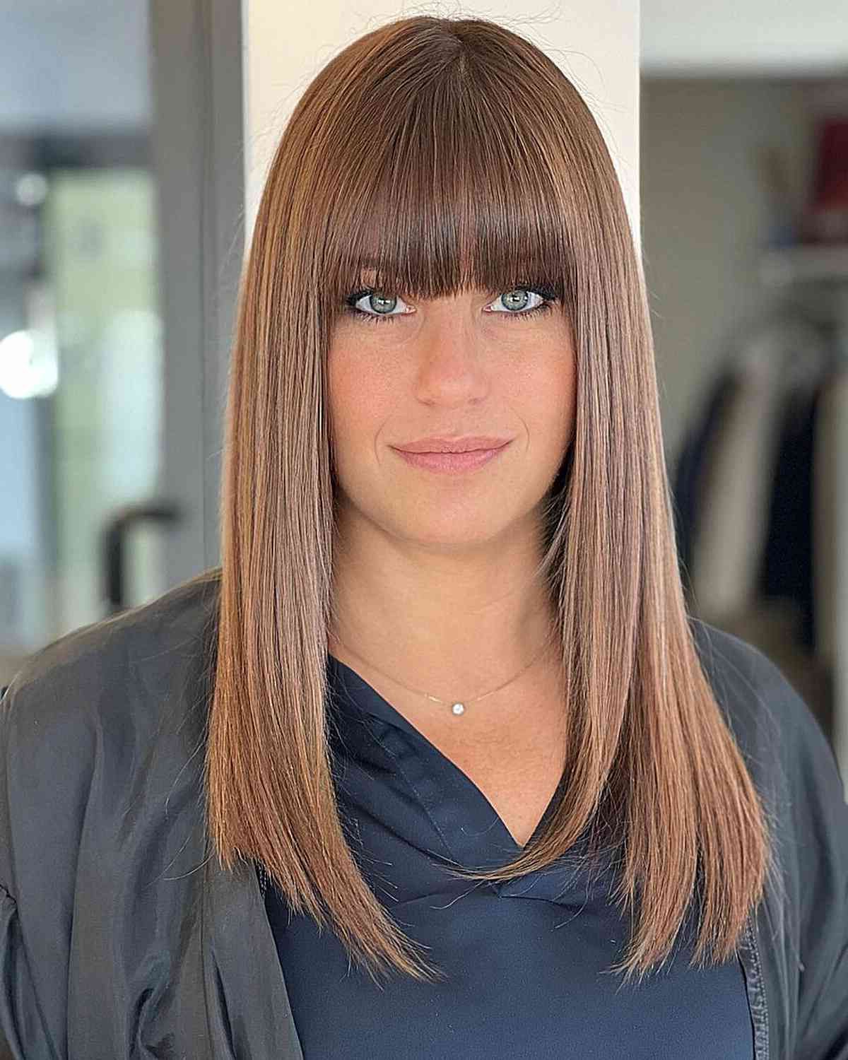38 Cutest Ways To Pair Straight Hair With Bangs Pertaining To Most Recent Medium Straight Sleek Hair With A Fringe (View 4 of 15)