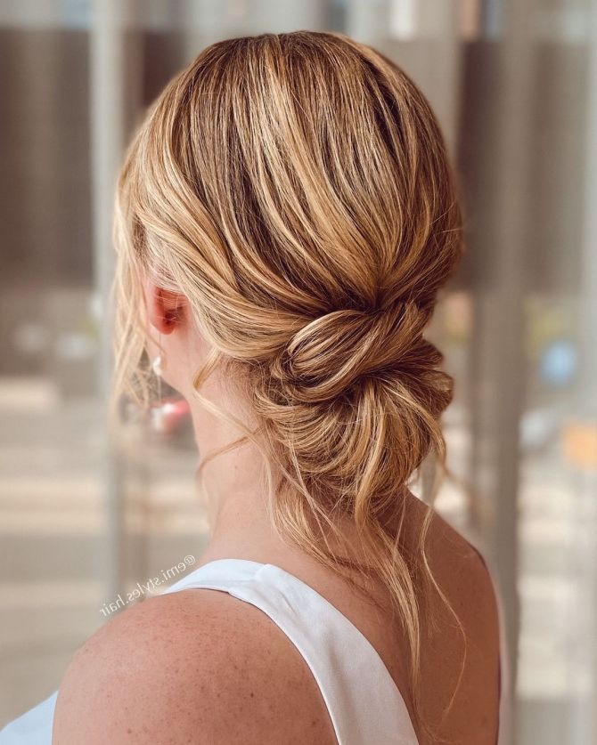40 Beautiful Updo Hairstyles For 2022 : Effortless Blonde Messy Knot Low Bun Intended For Most Recently Released Low Chignon Updo (View 11 of 15)