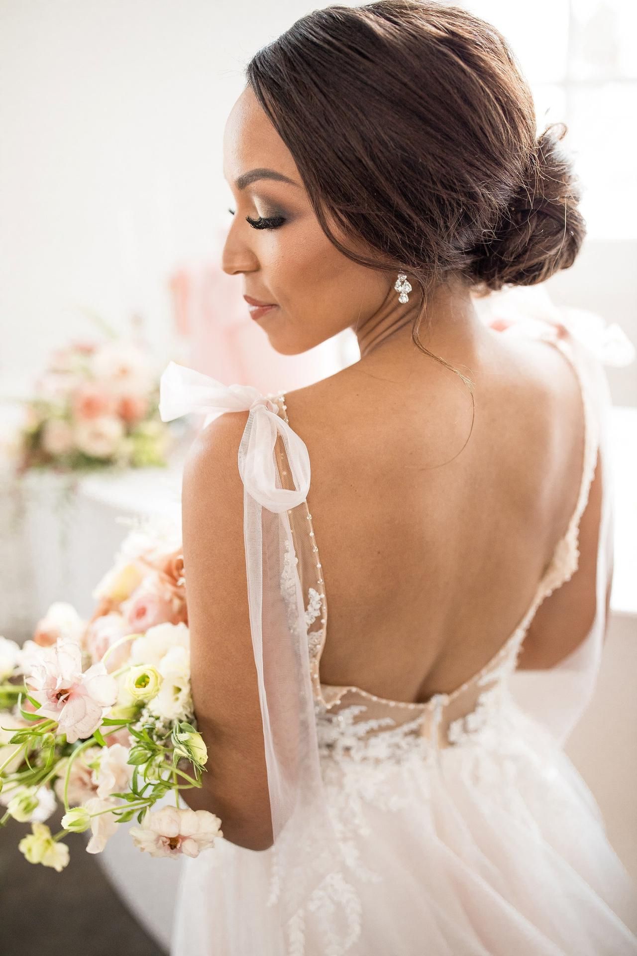 40 Wedding Hairstyles For Long Hair: Bridal Updos, Veils & More Pertaining To Most Current Low Flower Bun For Long Hair (View 13 of 15)