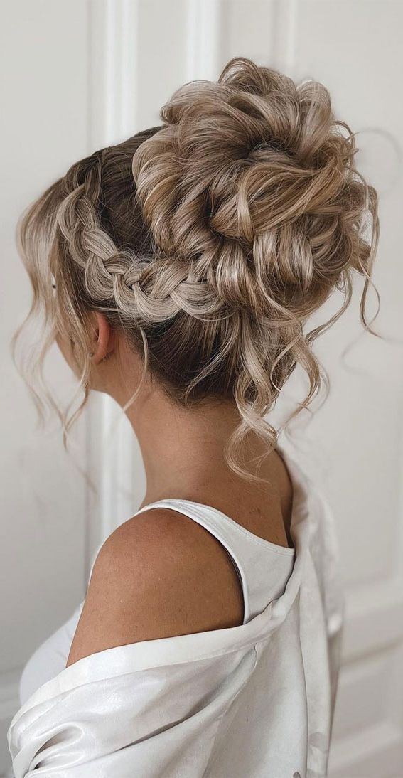 50+ Updo Hairstyles That're So Stylish : Side Braided High Bun Regarding 2019 Undone Side Braid And Bun Upstyle (View 4 of 15)