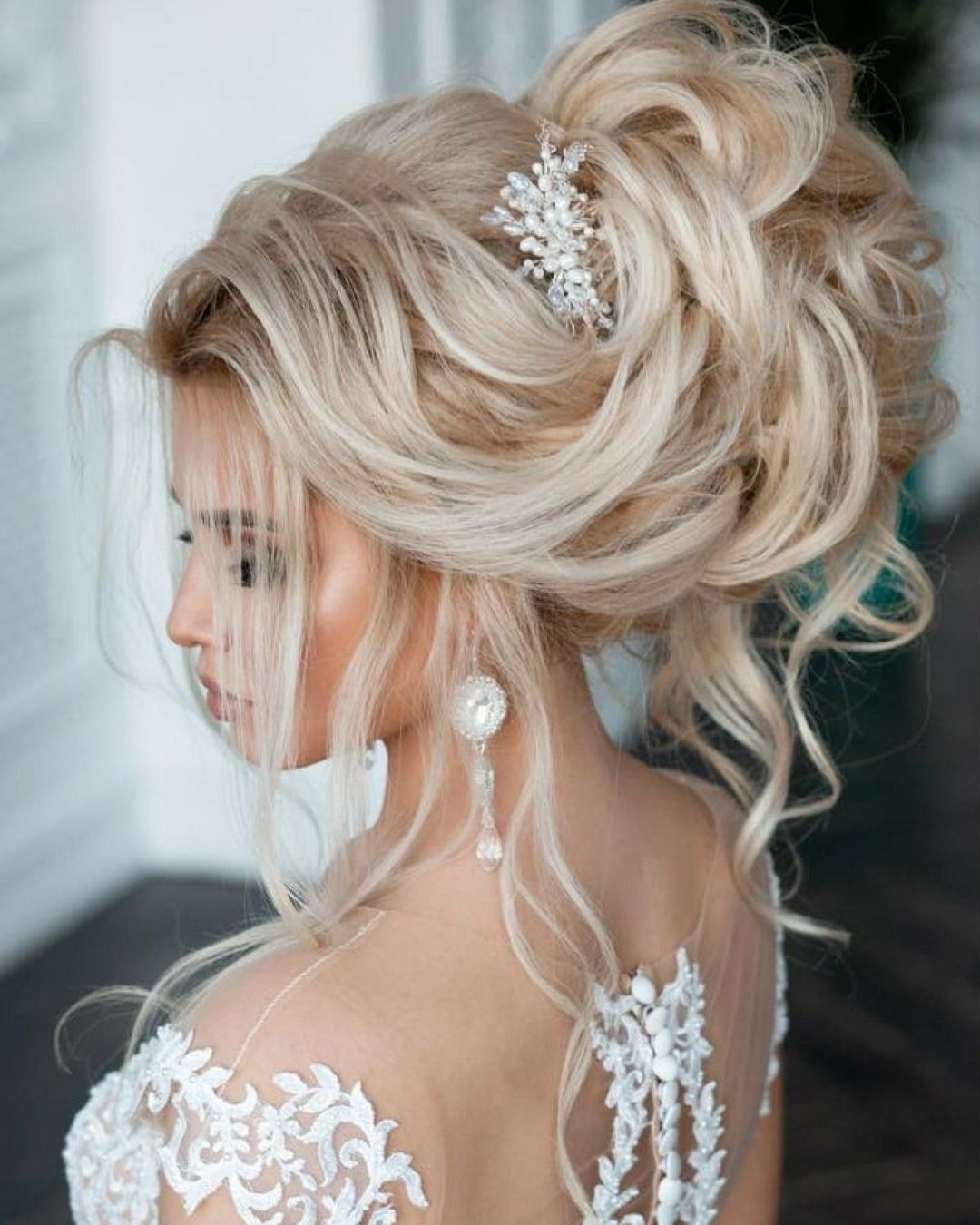 Beautifully Volume Updo And Elegant Hair Accessory (View 4 of 15)