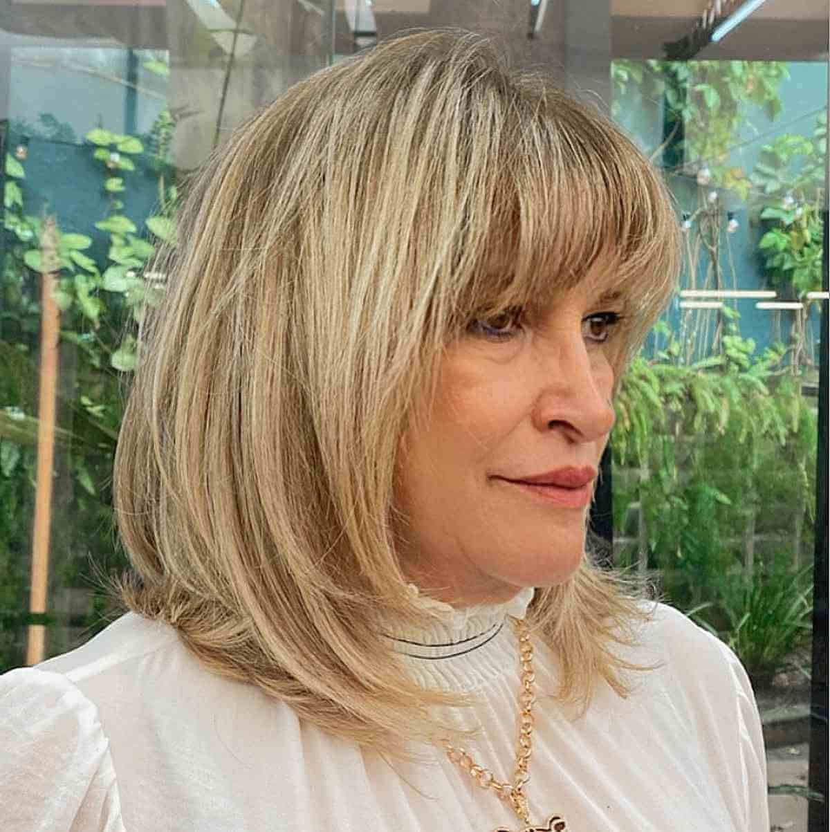 Best And Newest Blonde Razored Lob With Full Bangs Throughout 42 Trendiest Long Bob With Bangs + What To Consider Before Getting This (View 5 of 15)