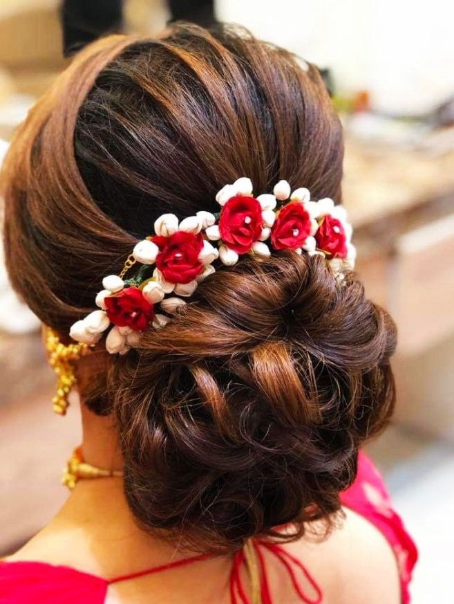 Bridal Hairstyles For Long Hair For Indian Brides For Newest Low Flower Bun For Long Hair (Gallery 8 of 15)