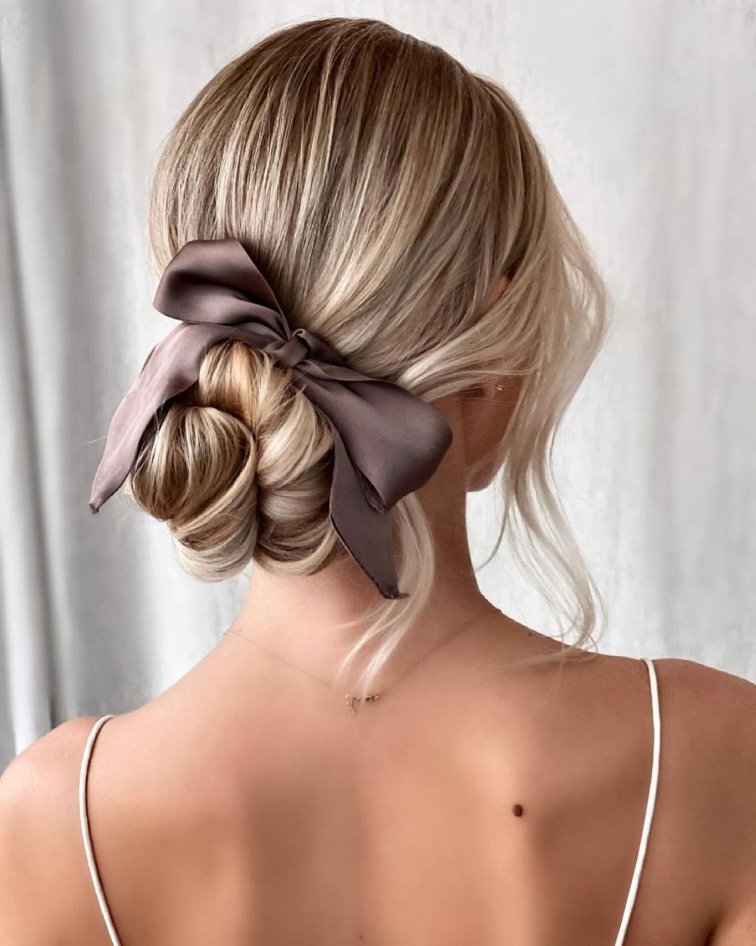Deer Pearl  Flowers Regarding Preferred Classic Updo With A Bow (Gallery 6 of 15)