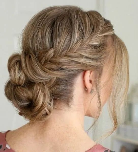 Latest Low Braided Bun With A Side Braid With Top 17 Side Braided Bun Hairstyles To Try In  (View 12 of 15)